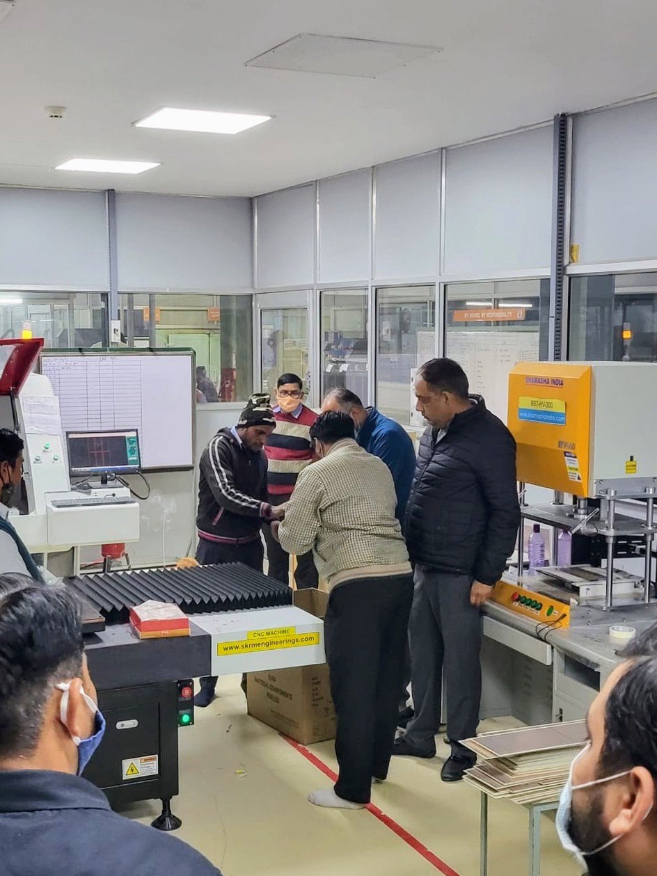 BBT press machine being operated by a technician